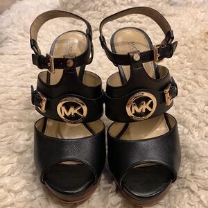 Michael Kors “Mackenzie” Platform Sandals